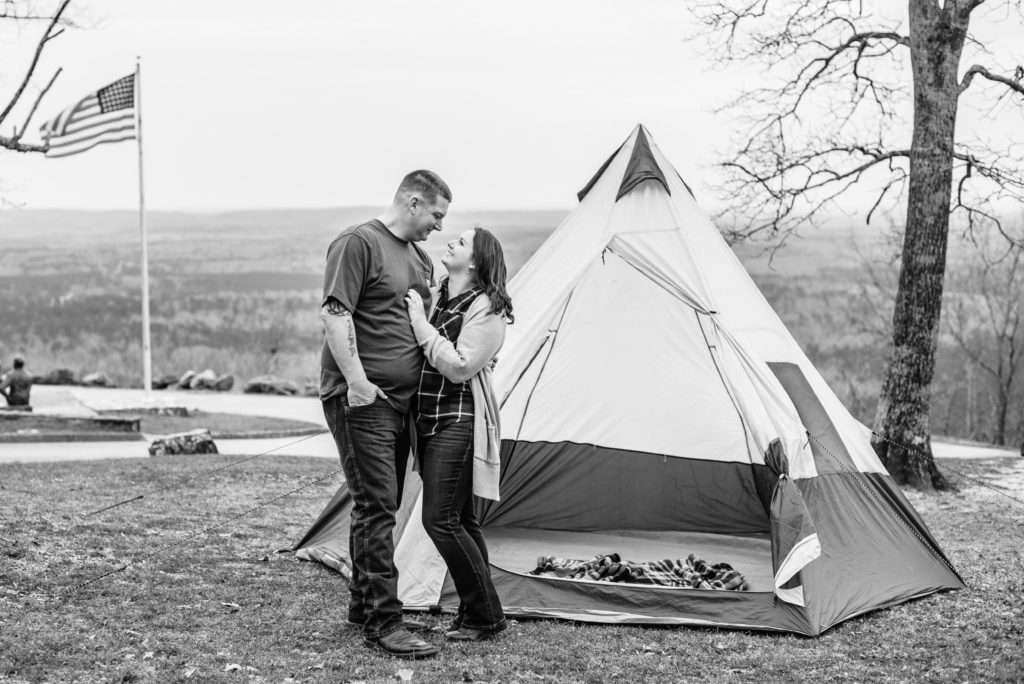 Black and white image of couple in front of tent at their FD Roosevelt State Park engagement session