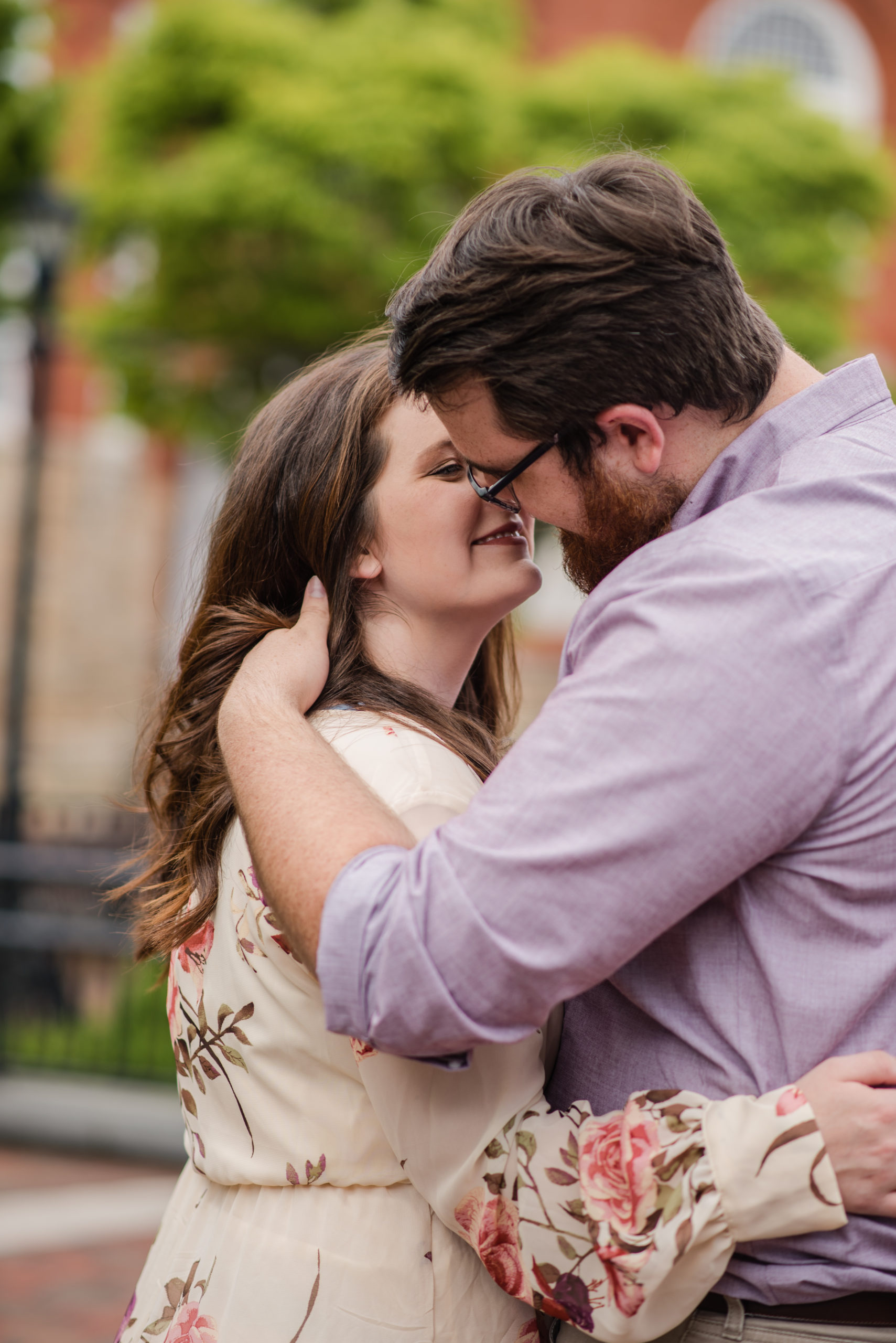 Engaged couple embracing, engaged couple kissing, engagement session, Candace Abbitt Photography, Newnan GA engagement photographer